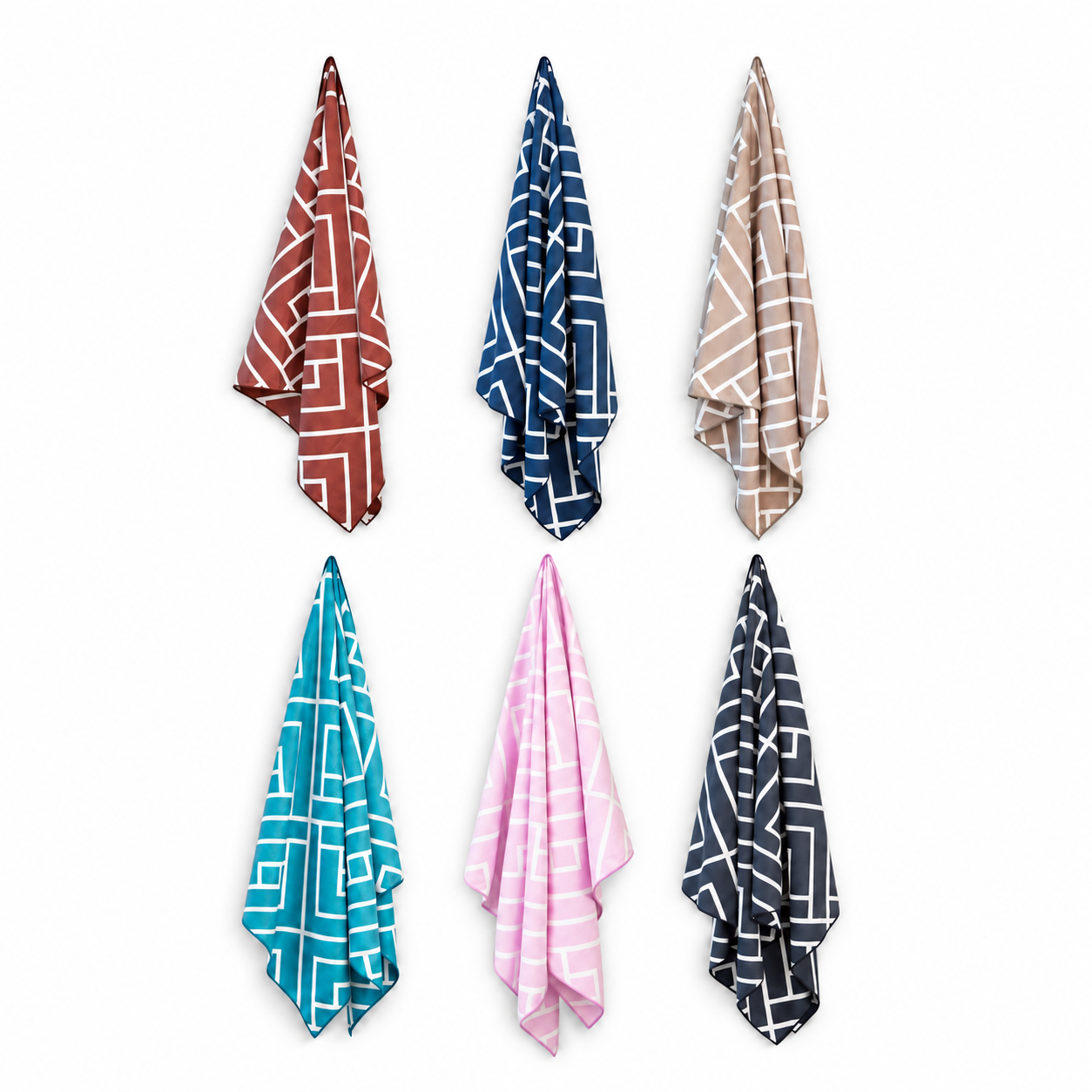 Six Newlyfe waffle-weave bath towels in Rust, Navy, Sandstone, Teal, Pink and Slate